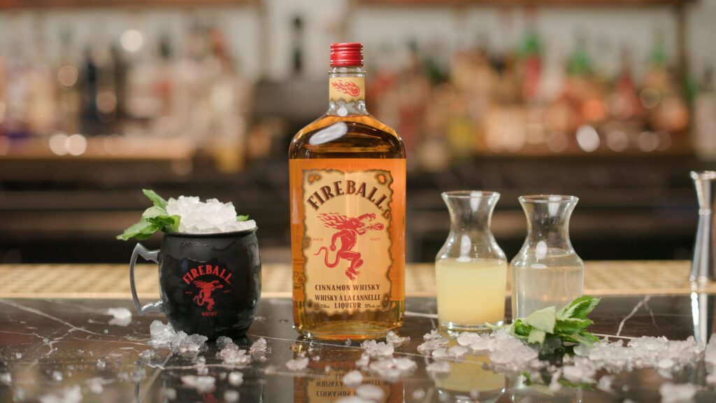 Fireball Mule whisky drink making at bar
